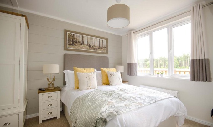 Ryther Cabin | Explore Hollicarrs - Woodland Lodge with Hot Tub & Pets Welcome