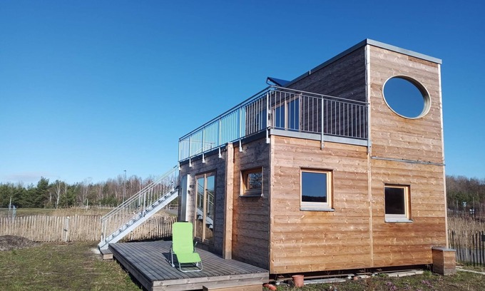 Lichterfeld-Schacksdorf House | Relax at Holzhaus am Bergheider See with Oceanfront Views