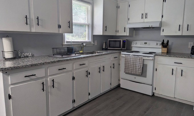 Darlington House | Cozy Home Away From Home with Kitchen & Family Amenities