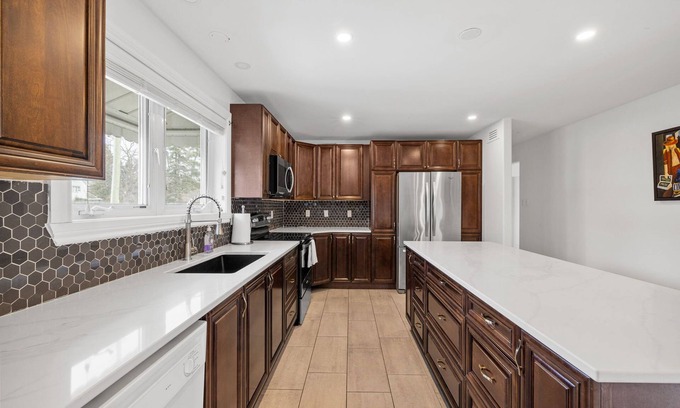 Westboro House | Home w hot tub/4 beds/4 car parking/1845 sq. ft.