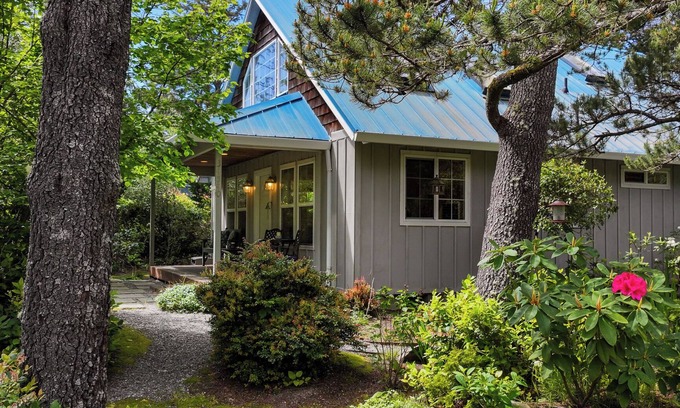 Manzanita House | Home with lots of character! Surrounded by trees, close to Nehalem Bay State Park and the beach.