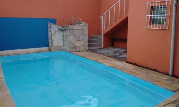 Mongagua House | Relaxing Beachside Retreat with Pool and Games Room