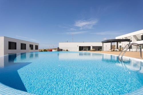 Los Gavilanes Apartment | Indulge in Home2Book Impressive Apt with Pool & Terrace