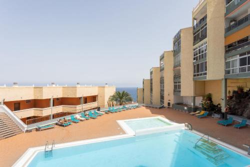 Las Caletillas Apartment | Home2Book Sea View Apartment with Terrace & Pool