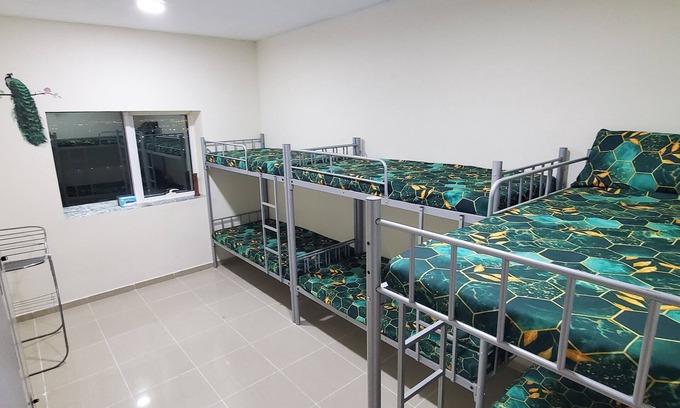 Sharjah Apartment | Homely Hostel - Spacious and clean bedspace in prime location on Al Wahda Street