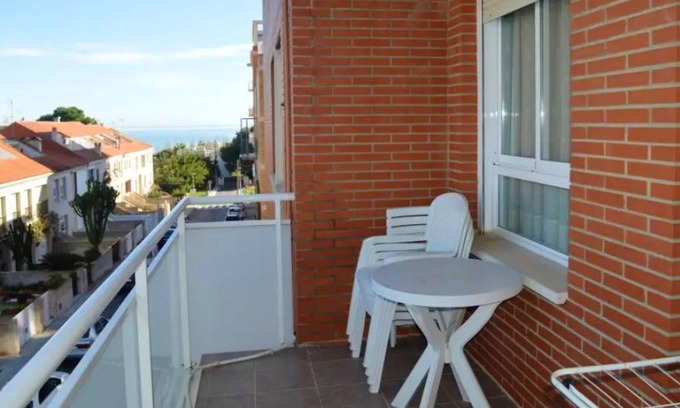 Sant Carles de la Rapita Apartment | Homerez - Appartement 700 m away from the beach for 4 ppl. with shared pool