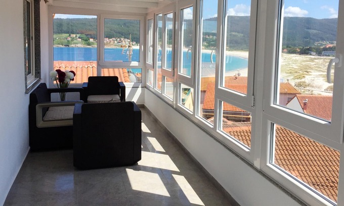 Laxe Apartment | Homerez - 80 m away from the beach! Appartement for 4 ppl. with sea view at Laxe