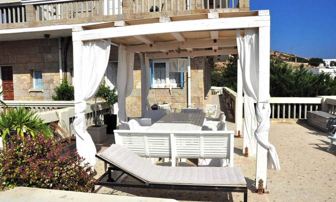 Psathi Apartment | Seaside Retreat: Ocean View Apartment Near Psathi Beach