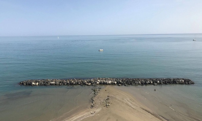Nettuno Apartment | Beachfront Apartment in Nettuno with Pool and Ocean Views