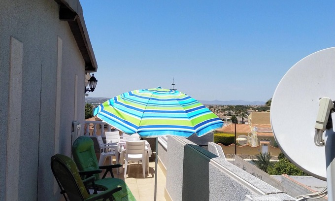 La Siesta Apartment | Cozy Apartment Near the Beach with Shared Pool Access