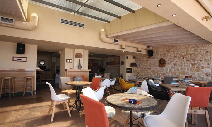 Akrogialion Apartment | Experience Oceanfront Bliss at Homerez Seaside Apartment