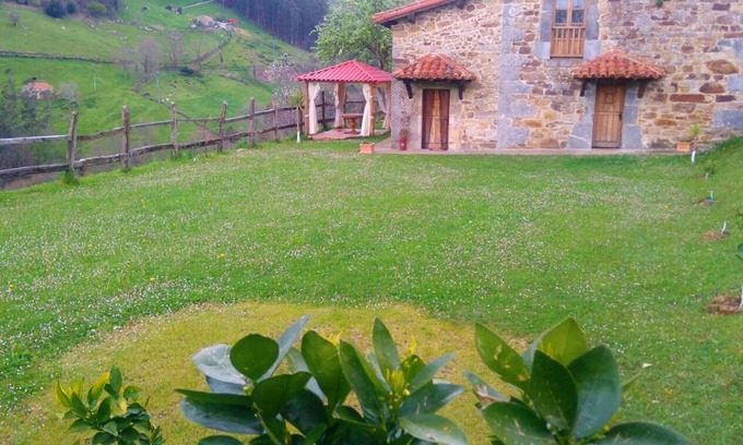 Riotuerto House | Homerez - Big house for 10 ppl. with jacuzzi, terrace and balcony at La Cavada