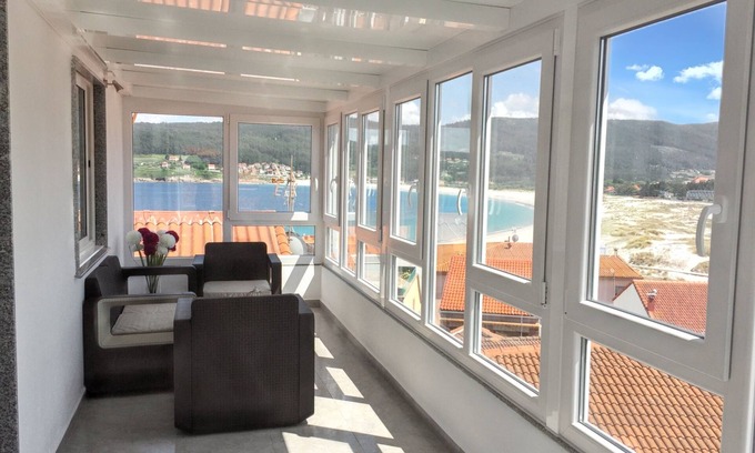Laxe Apartment | Beachfront Apartment with Sea View for 4 in Laxe