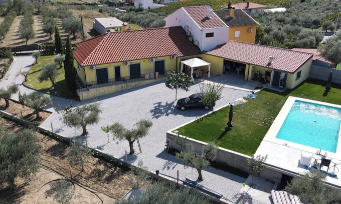 Vila Flor Villa | Inviting Villa in Lodões with Shared Pool & Ocean Views