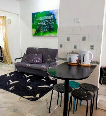 Tanjung Tanah Merah Apartment | Family-Friendly Homestay with Ocean Views at Laguna Condo