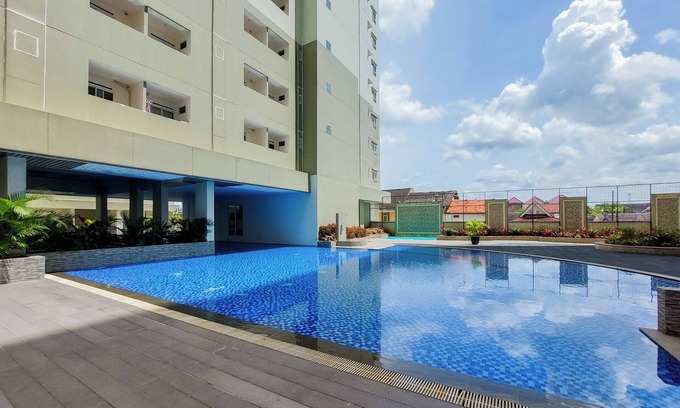 South Tangerang Apartment | Modern 2BR Loftville City Apartment with Pool & Breakfast