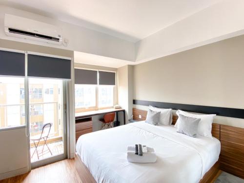 Duren Sawit Apartment | Cozy Gateway Park LRT Studio Apartment in Bekasi