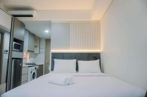 Pantai Indah Kapuk Apartment | Cozy Studio Retreat on 28th Floor at Gold Coast Apartment