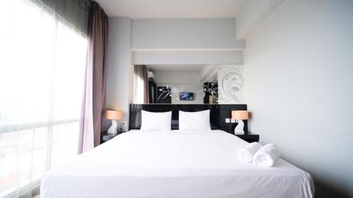 Wonokromo Apartment | Cozy Studio Retreat at Grand Darmo Suite Apartment