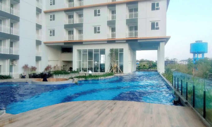 Sidoarjo Apartment | Homey Studio With Easy Pool Access Apartment At Suncity Residence