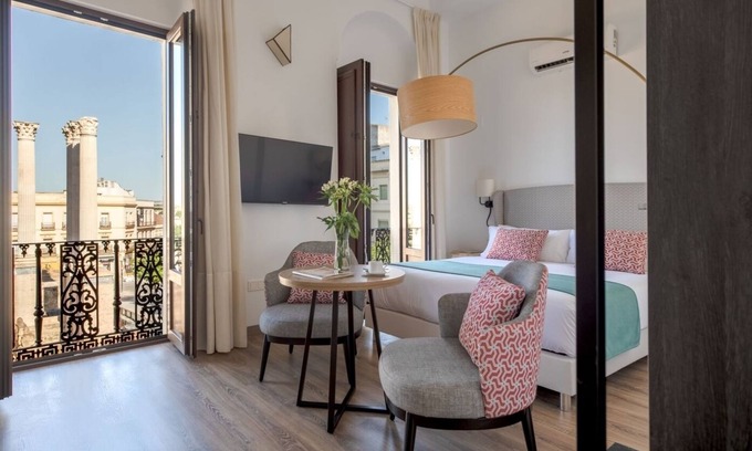 Distrito Centro Apartment | Cozy Hommyhome Coliseum 104: Family-Friendly Retreat