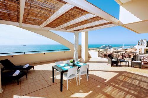 Civitavecchia Apartment | HomyHome: Oceanfront Retreat with Private Beach & 9.8 Rating