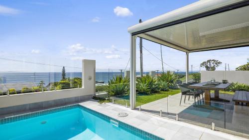 Woolgoolga House | Horizons: Premier 4-Star Stay with Pool & Pet-Friendly Perks