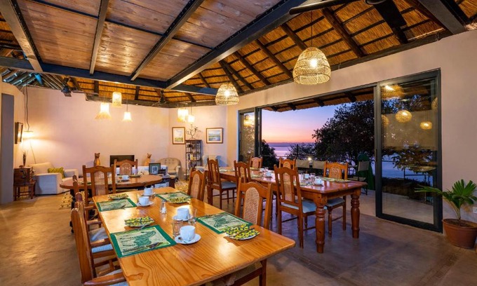 Kariba Cabin | Experience Hornbill Lodge: Oceanfront Haven with Pool