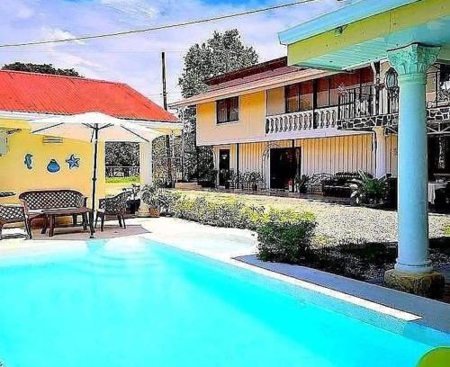 Ciudad Cortes House | Pet-Friendly Retreat at Hospedaje La Galerie with Ocean Views