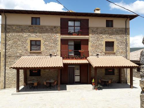 Undues-Pintano Hotel | Discover Comfort at Hospedería Prepirineo with Pool Access