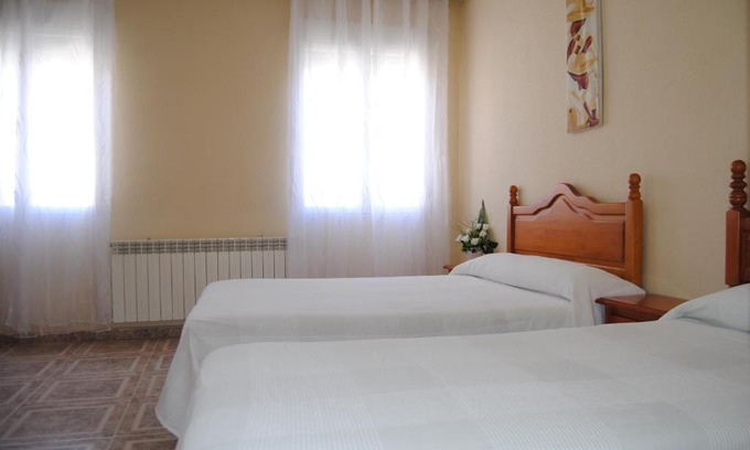Ocana House | Budget-Friendly Stay at Hostal Ávila with Family & Pets Welcome