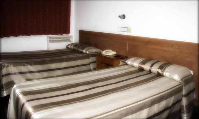 El Gancho House | Budget-Friendly Hostal Aisa Ochoa: Family-Oriented Comfort