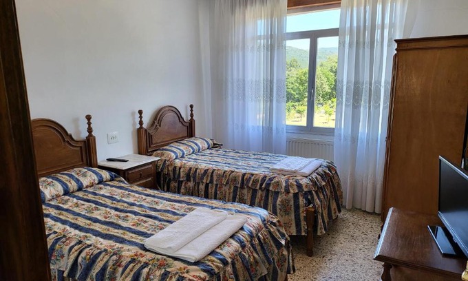 Entrimo House | Budget-Friendly Hostal Barcelona: Pet & Child Friendly Stay