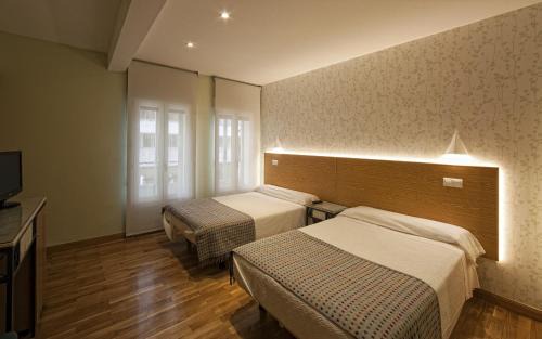 Burgos House | Welcoming Hostal Bezana: Accessible Stays with Breakfast