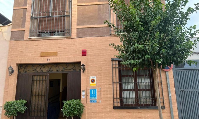 Puente Genil House | Cozy Hostal el Pasaje: Pet Friendly with Family Amenities