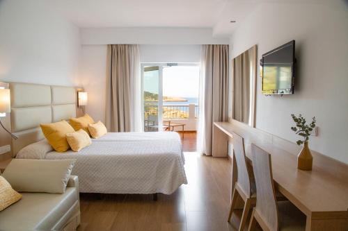 Portinatx Hotel | Oceanfront Hostal La Cigüeña: Rated 9.2 with Pool & Restaurant