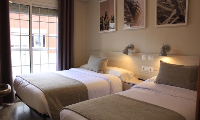 Sabadell House | Cozy Hostal La Romànica: Family-Friendly Charm Awaits