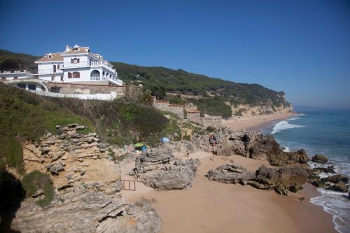 Los Canos de Meca House | Oceanfront Hostal Mar de Frente with Exceptional Ratings