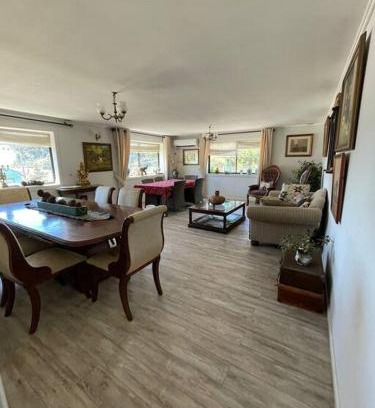 Constitucion House | Discover Comfort at Hostal Nomade - 4-Star Family-Friendly Stay