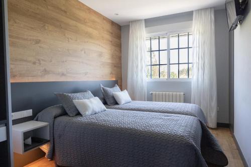 O Pino House | Budget-Friendly Hostal O'Cruceiro with Top Reviews