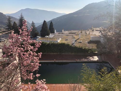 Capileira Hotel | Discover Hostal Rural Poqueira: Oceanfront Retreat Awaits