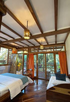 Puerto Lopez Hostel | Pet-Friendly Hostería Mandála with Oceanfront Pool Access