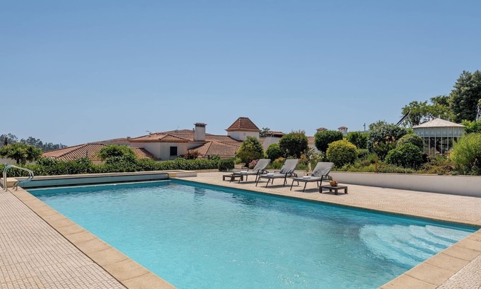 Paredes House | HostWise - Modern Comfort and Shared Pool in Paredes