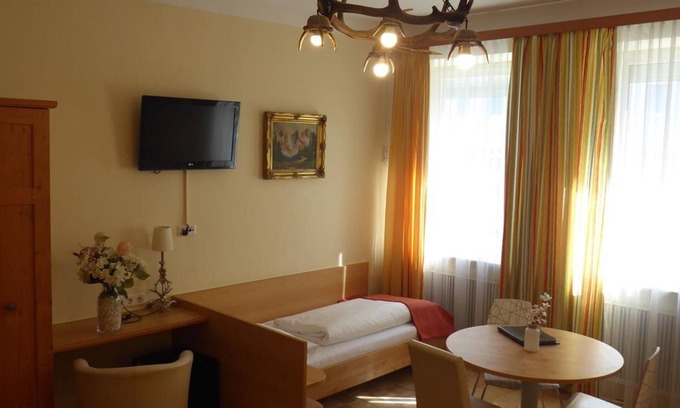 Elisabeth-Vorstadt Bed & Breakfast | Book Your Quadruple Room at Adlerhof Pension Today