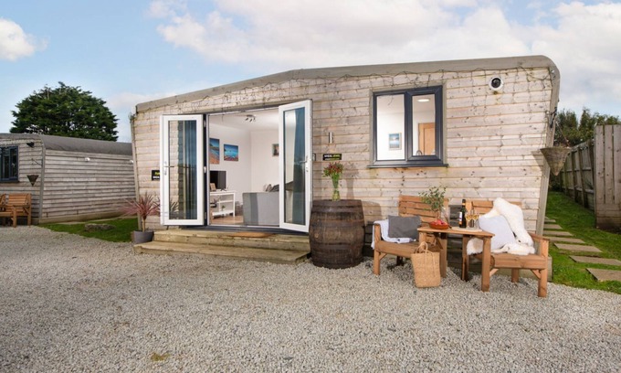Helford Passage House | Relaxing Wheal Jewel Hot Tub Lodge with Ocean Views