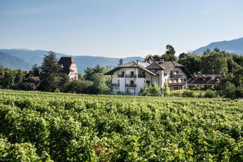St. Michael/San Michele Hotel | Discover Hotel Weingut Stroblhof: 4-Star Oceanfront Retreat