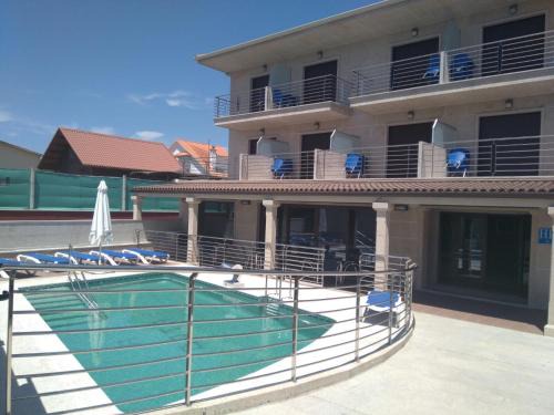 Portonovo Hotel | Hotel A Bota: Oceanfront Retreat with 9.5/10 Guest Rating