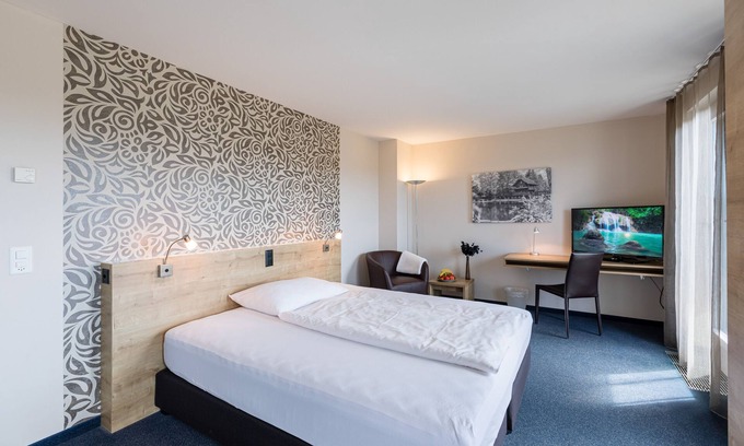 Oberentfelden Hotel | Discover Hotel aarau-WEST: Eco-Friendly Comfort Awaits