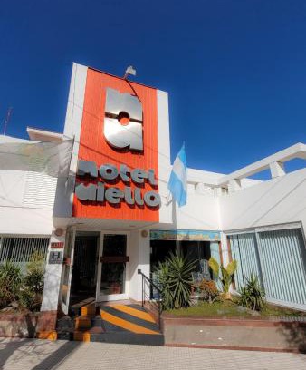 San Luis Hotel | Hotel Aiello: Oceanfront Escape with Pool & Breakfast