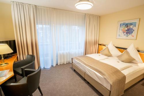 Radolfzell am Bodensee Hotel | Discover Hotel am Stadtgarten: Family-Friendly Comfort Awaits